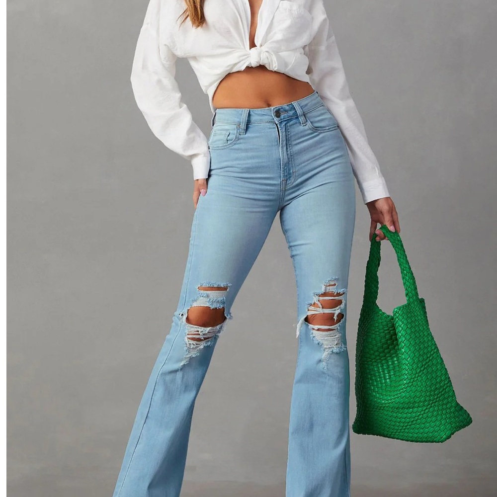 Ripped denim flare jeans